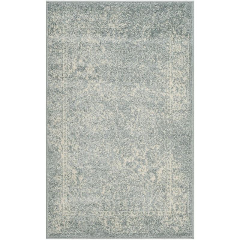 Slate and Ivory Floral Synthetic Area Rug