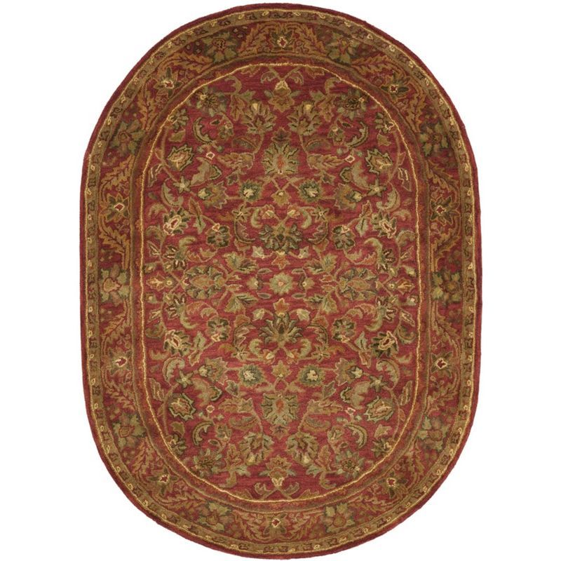 Red Oval Hand Tufted Wool Area Rug 4' x 6'