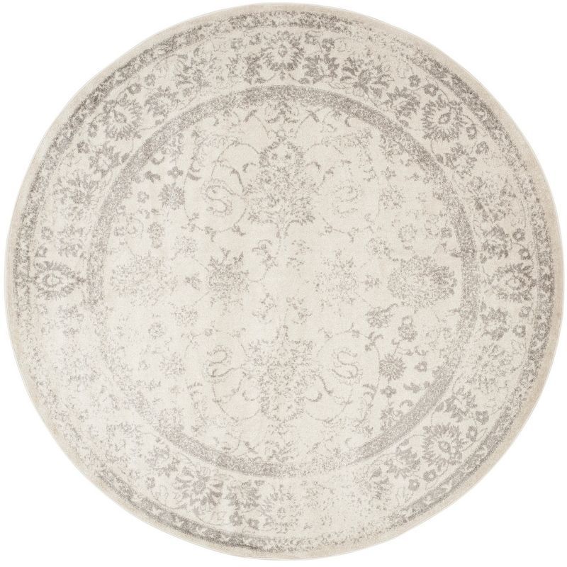 Ivory and Silver Round Synthetic Easy Care Area Rug