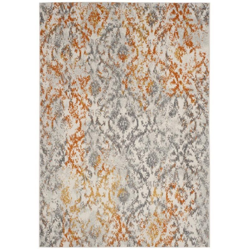 Ivory and Orange Synthetic 6' x 9' Damask Area Rug