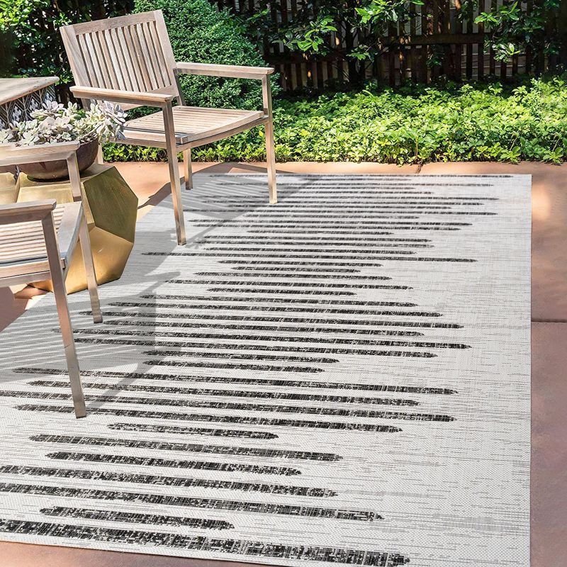 Ivory and Black Striped Synthetic Indoor/Outdoor Rug