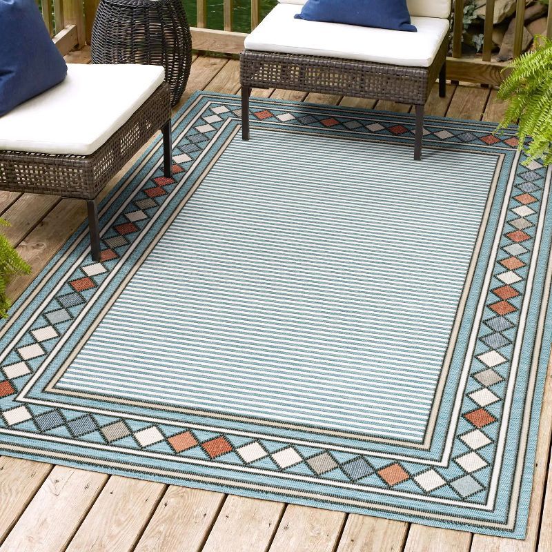 Sebastian Blue and Ivory Geometric Synthetic 5' x 8' Area Rug