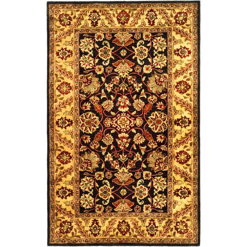 Elegant Jaipur Heritage Black and Gold 5' x 8' Wool Area Rug