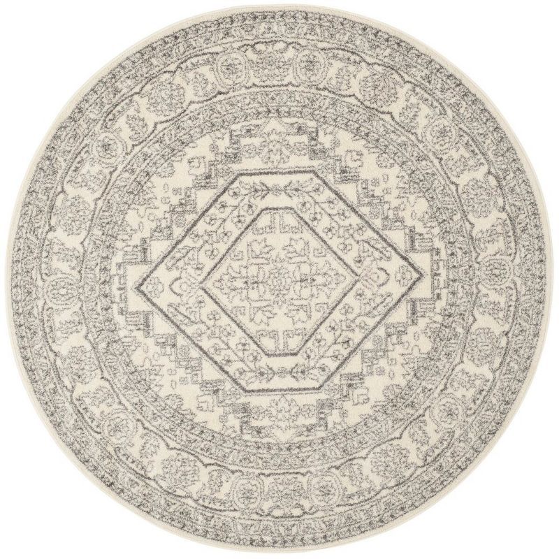 Ivory and Silver Round Synthetic Easy-Care Area Rug