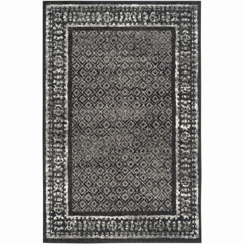 6' x 9' Black and Silver Synthetic Reversible Area Rug