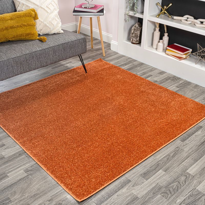 Haze Solid Orange 5'3" Square Synthetic Area Rug