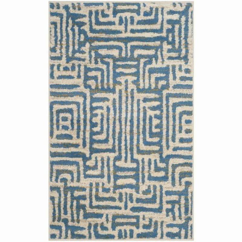 Ivory and Light Blue Geometric Low Pile Area Rug