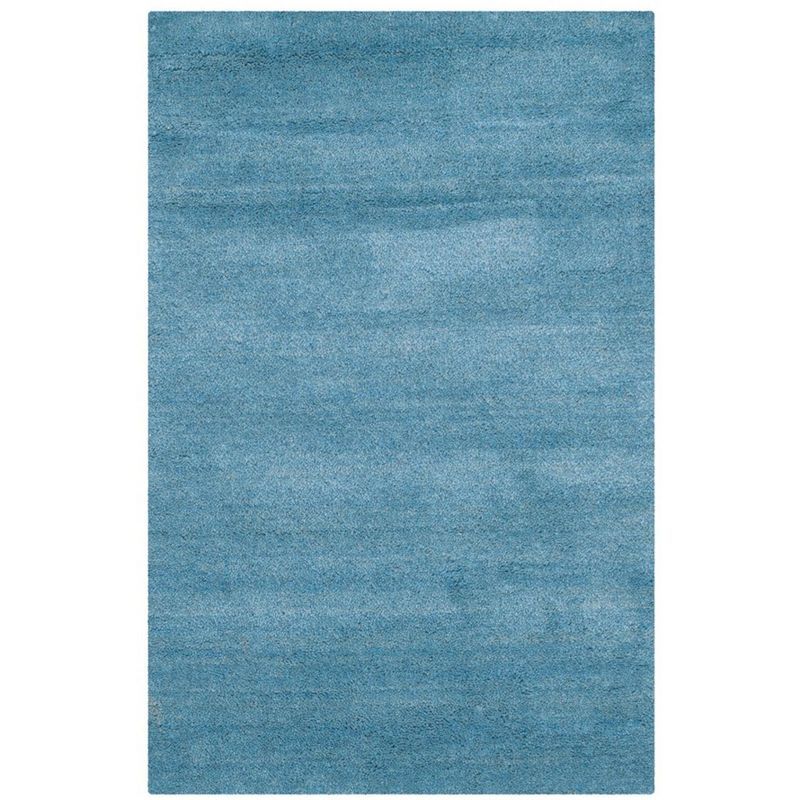 Handmade Coastal Blue Solid Wool Rectangular Accent Rug