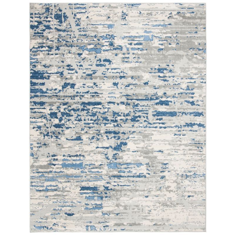 Ivory/Blue Abstract Synthetic 8' x 10' Easy Care Area Rug