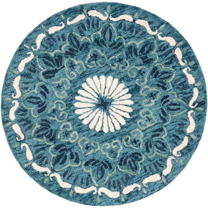 Handmade Blue and Ivory Round Wool Area Rug