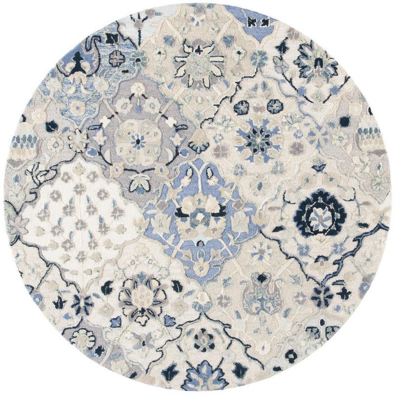 Elegant Charmaine Blue Wool 6' Round Hand-Tufted Area Rug