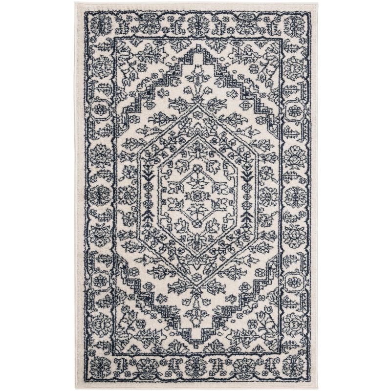 Ivory and Navy Rectangular Synthetic Area Rug