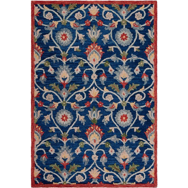 Handmade Blue and Rust Wool Floral Area Rug