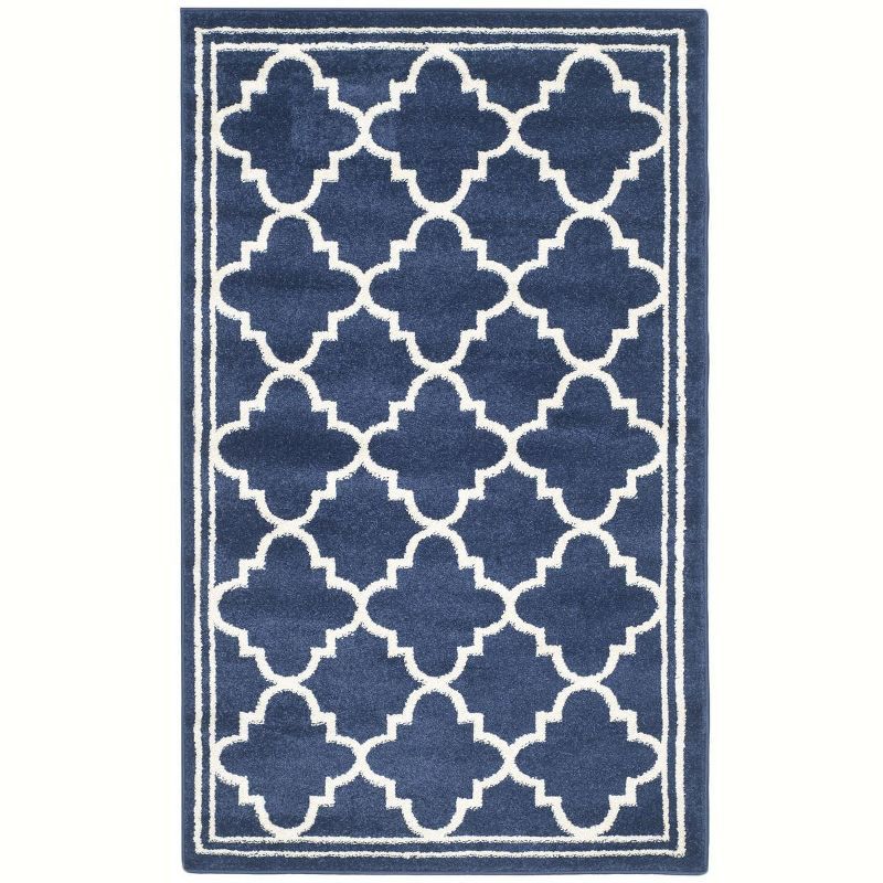 Navy and Beige Geometric 4' x 6' Synthetic Area Rug