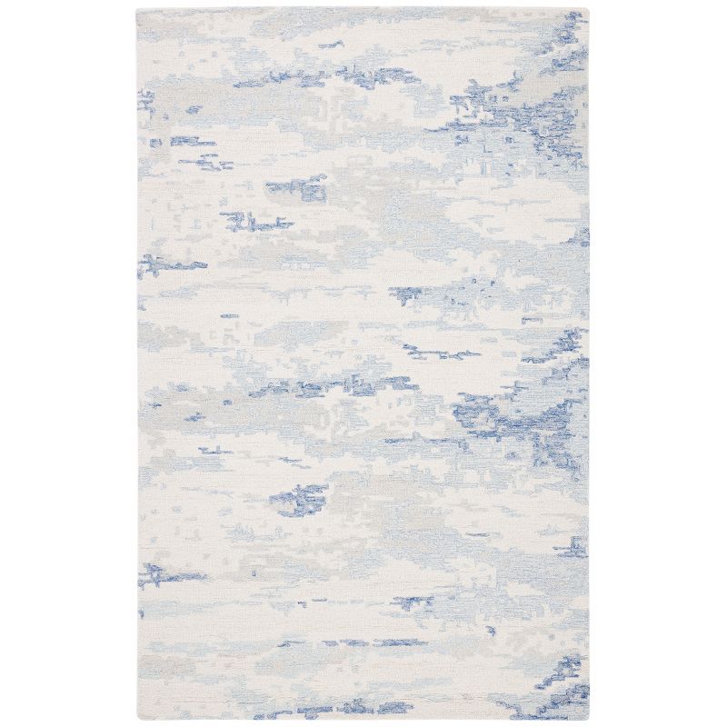 Ivory and Blue Handmade Wool Abstract Area Rug