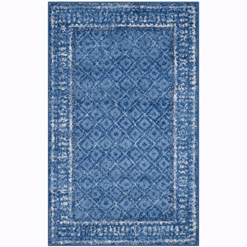 Light Blue and Dark Blue Floral Motif Area Rug