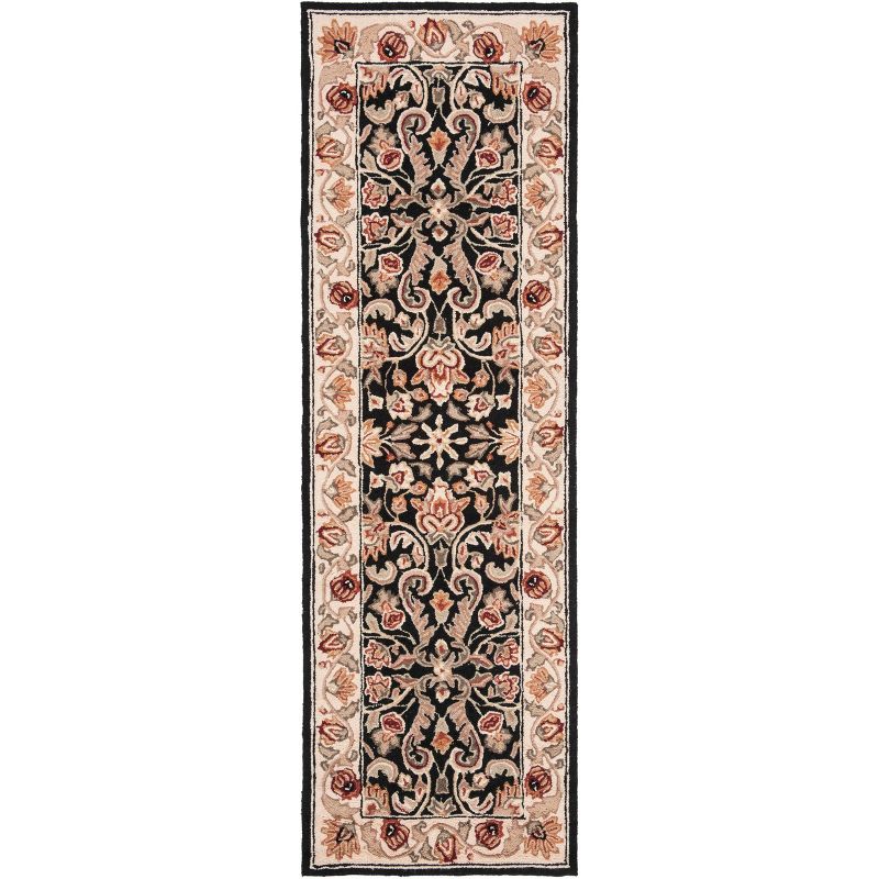 Elegant Easy-Care Black/Ivory Hand-Hooked Synthetic 3' x 6' Rug
