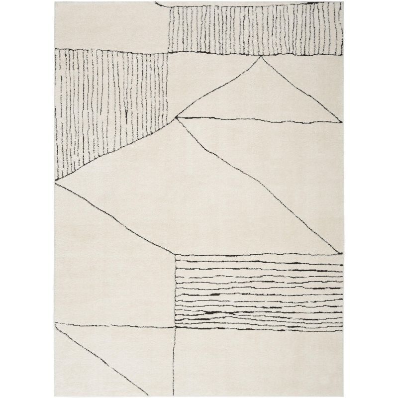 Black and Ivory Abstract Synthetic 8' x 10' Area Rug