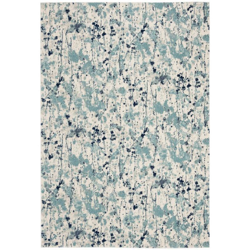 Ivory and Blue Reversible Easy-Care Synthetic Area Rug