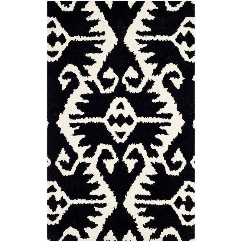 Handmade Black and Ivory Tufted Wool Area Rug