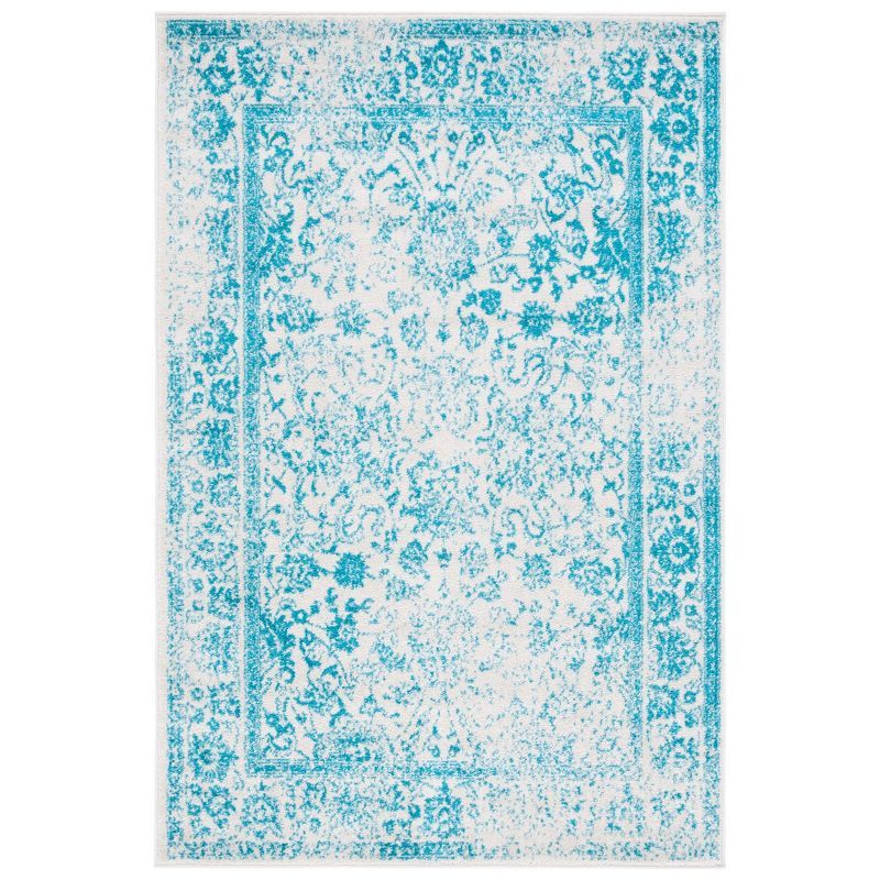 Ivory and Teal Medallion 6' x 9' Easy-Care Synthetic Area Rug