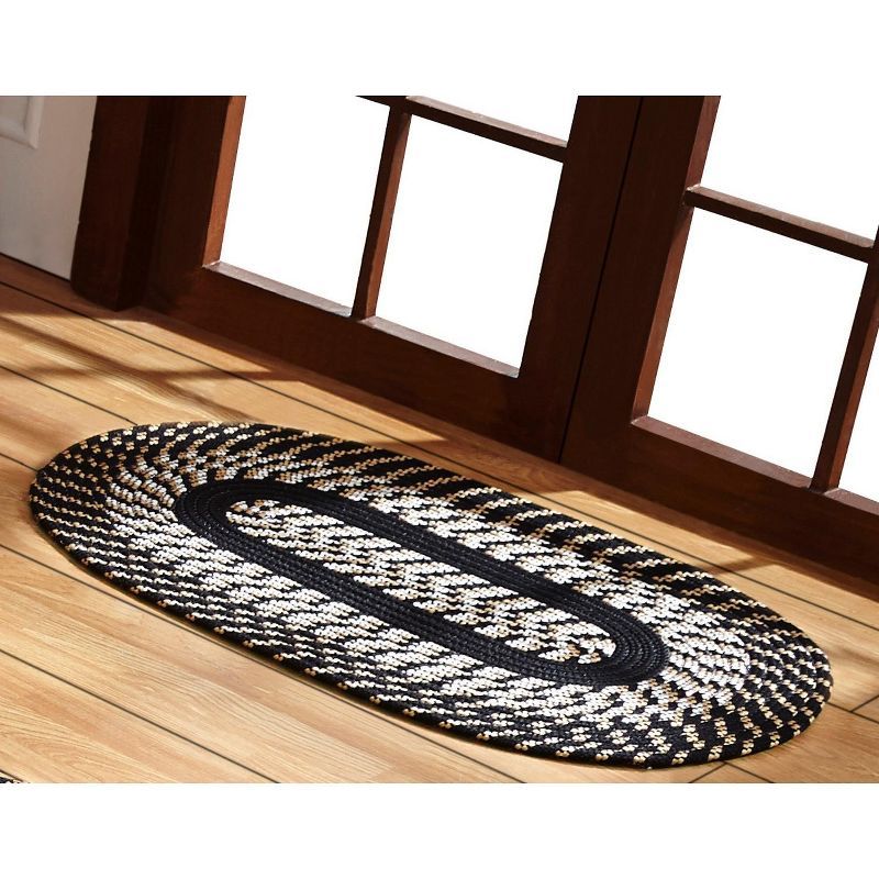 Newport Braided Oval Rug in Black - Synthetic, Reversible and Washable