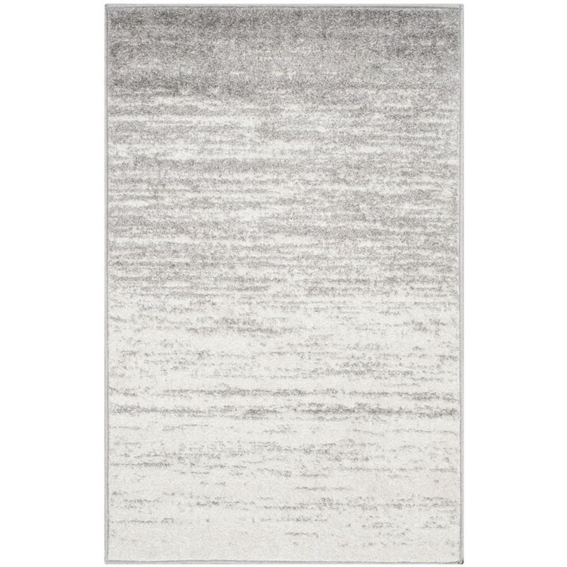 Ivory and Silver Low Pile Abstract Area Rug