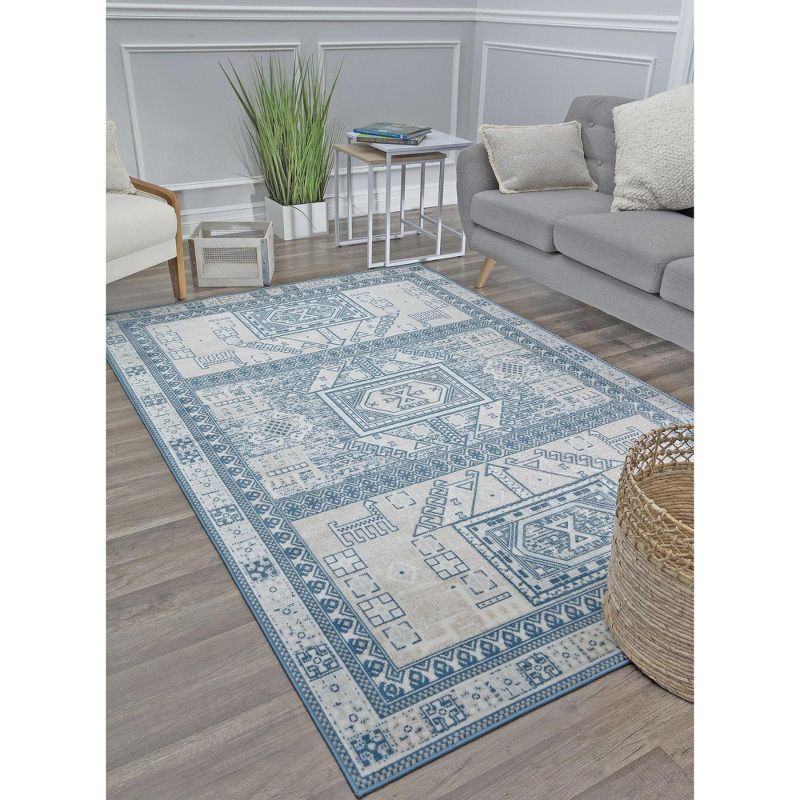 Azure Elegance 5' x 7' Reversible Blue Synthetic Area Rug