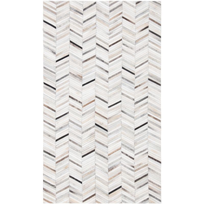 Handmade Ivory Geometric Cowhide Area Rug