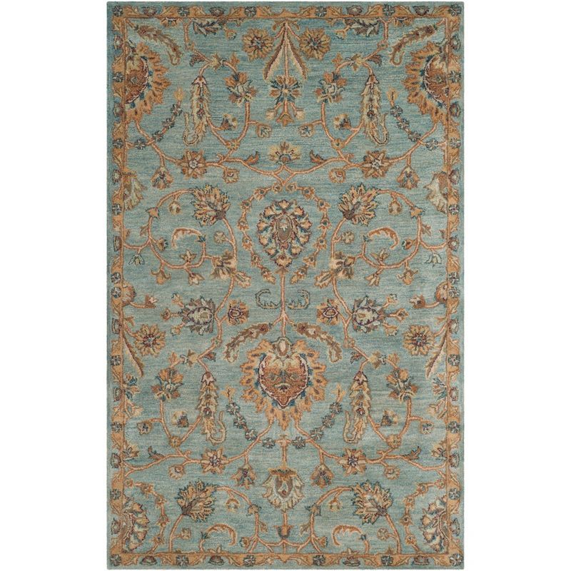 Elegant Heritage Hand-Tufted Light Blue Wool Rectangular Rug