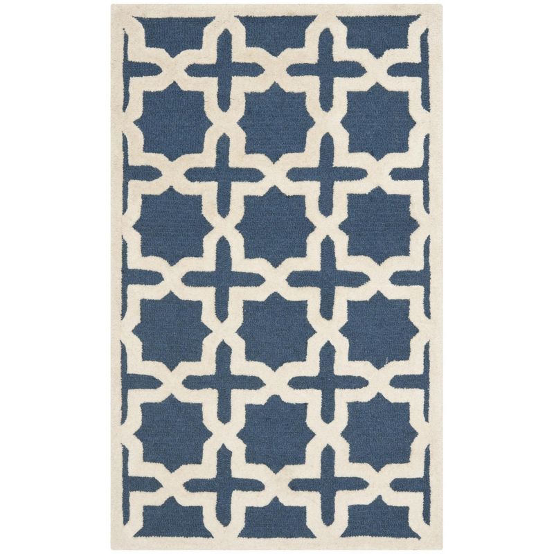 Navy Blue and Ivory Wool Geometric 4' x 6' Area Rug