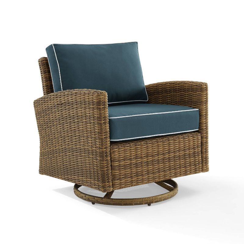 Bradenton Weathered Brown Wicker Swivel Rocker Chair with Navy Cushions