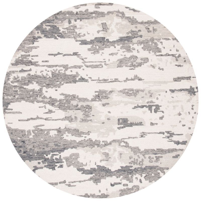 Handmade Tufted Charcoal/Ivory Round Wool Area Rug