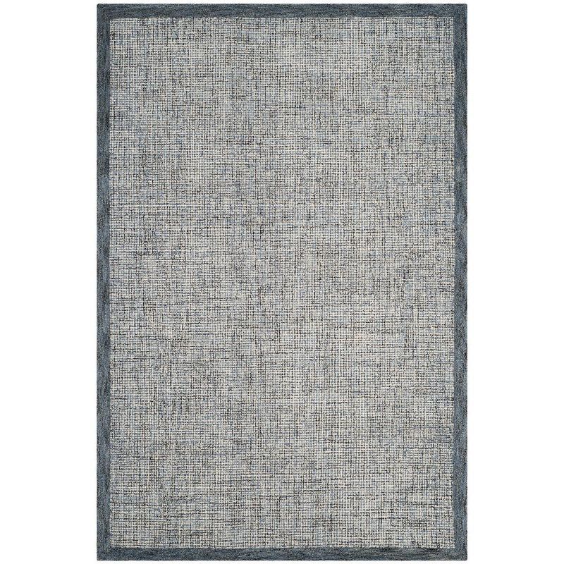 Navy and Ivory 6' x 9' Tufted Wool Abstract Rug