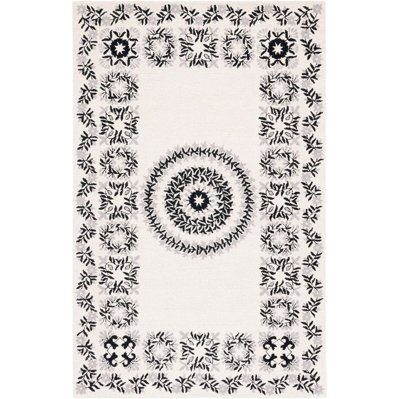 Empire Black and Ivory Hand-Tufted Wool Area Rug