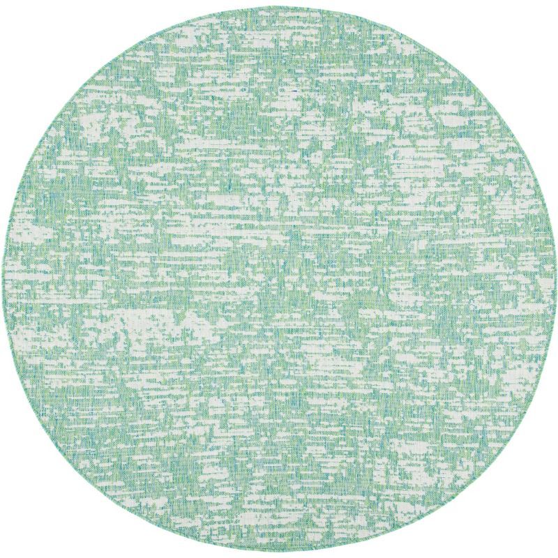 Ivory Elegance 79" Round Synthetic Indoor/Outdoor Area Rug