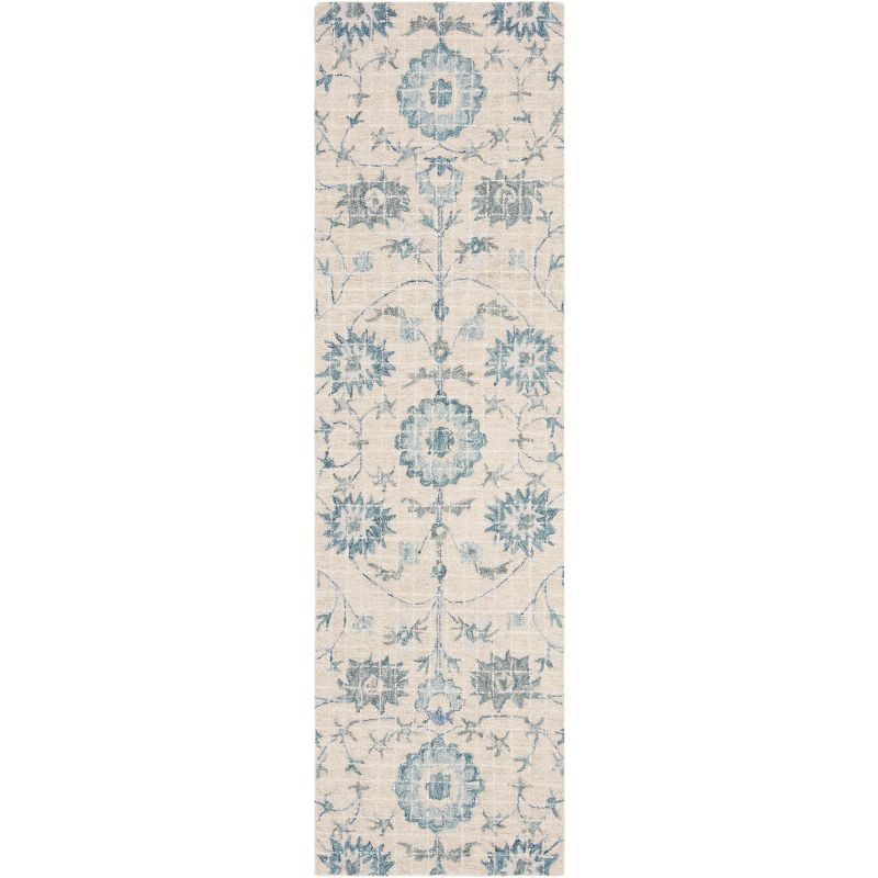 Handmade Tufted Blue Floral Wool Accent Rug