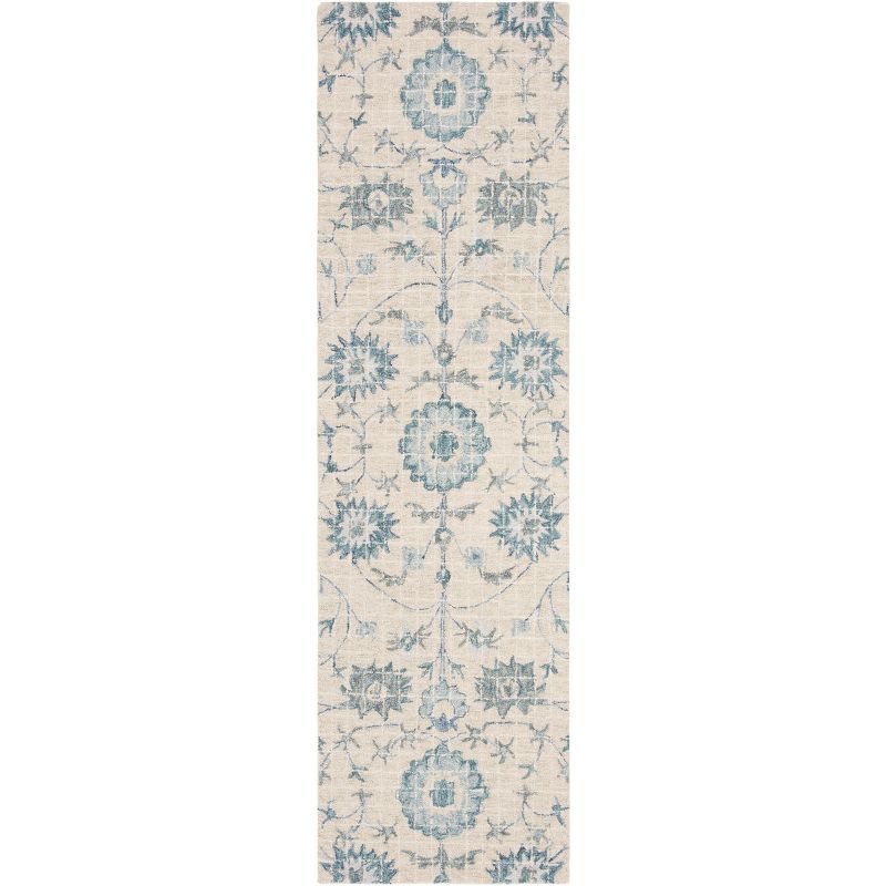 Handmade Tufted Blue Floral Wool Accent Rug