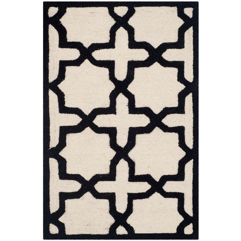 Hand-Tufted Black and Ivory Wool Area Rug, 2'6" x 4'