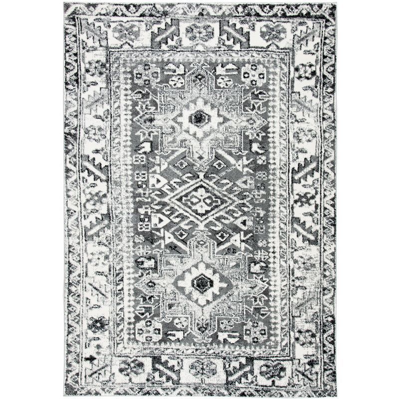 Grey and Ivory Floral 8' x 10' Synthetic Area Rug