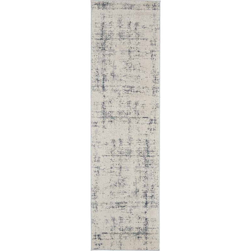 Ivory and Blue Abstract Synthetic 2'2" x 7'6" Area Rug