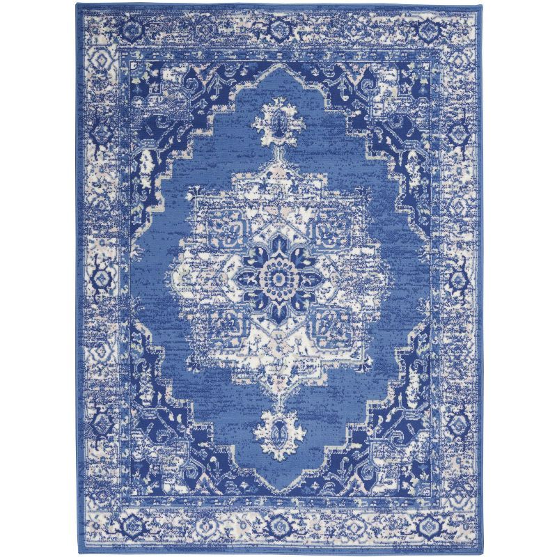 Navy Floral 6' x 9' Synthetic Rectangular Area Rug