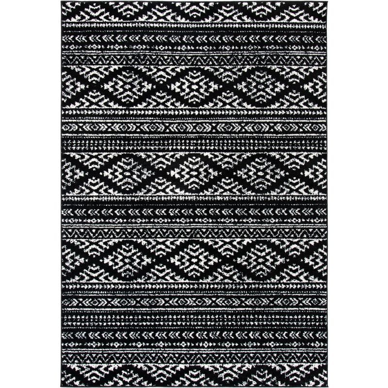 Black and Ivory Geometric Synthetic Area Rug