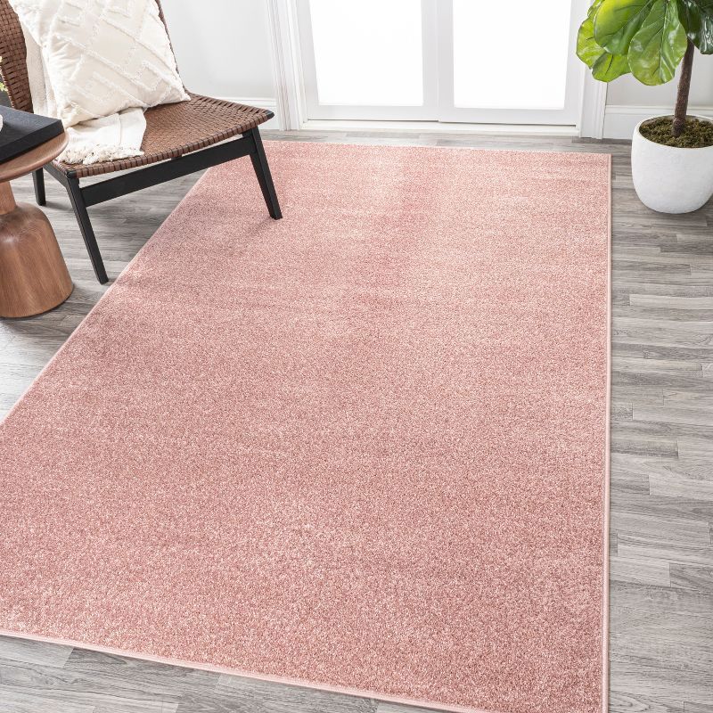 Reversible Solid Pink Synthetic 4' x 6' Easy-Care Area Rug