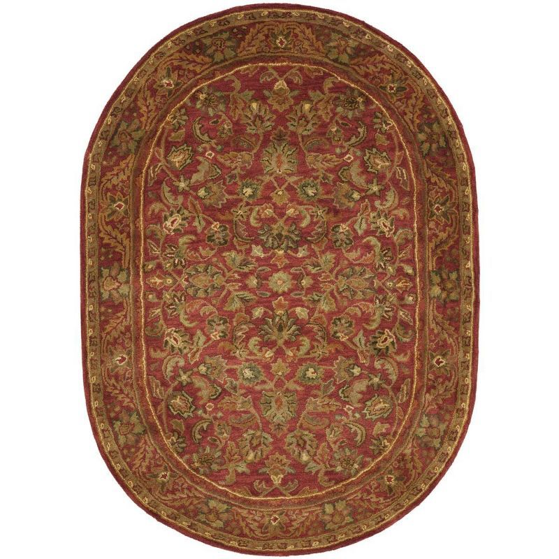 Red Oval Hand Tufted Wool Area Rug 4' x 6'