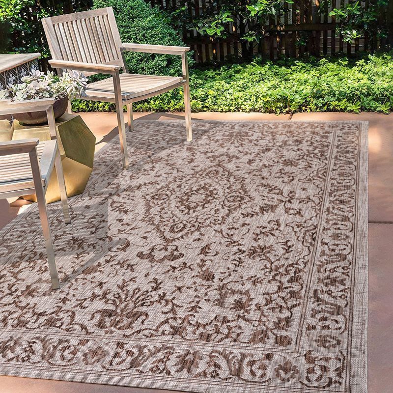 Ivory and Brown Medallion 8' x 10' Synthetic Rug