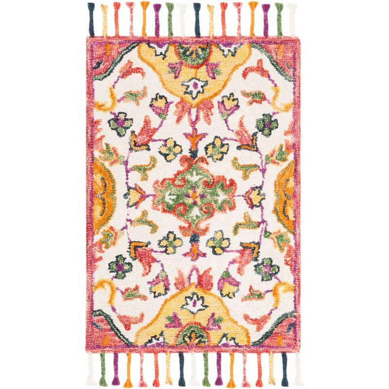 Handmade Ivory Floral Wool Rectangular Accent Rug with Tassels