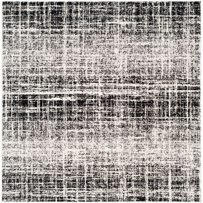 Ivory and Black Abstract Square Synthetic Accent Rug 4'x4'