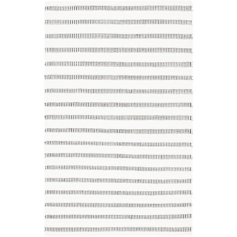 Handmade Tufted Wool Rectangular Rug 6' x 9' in Black and Ivory