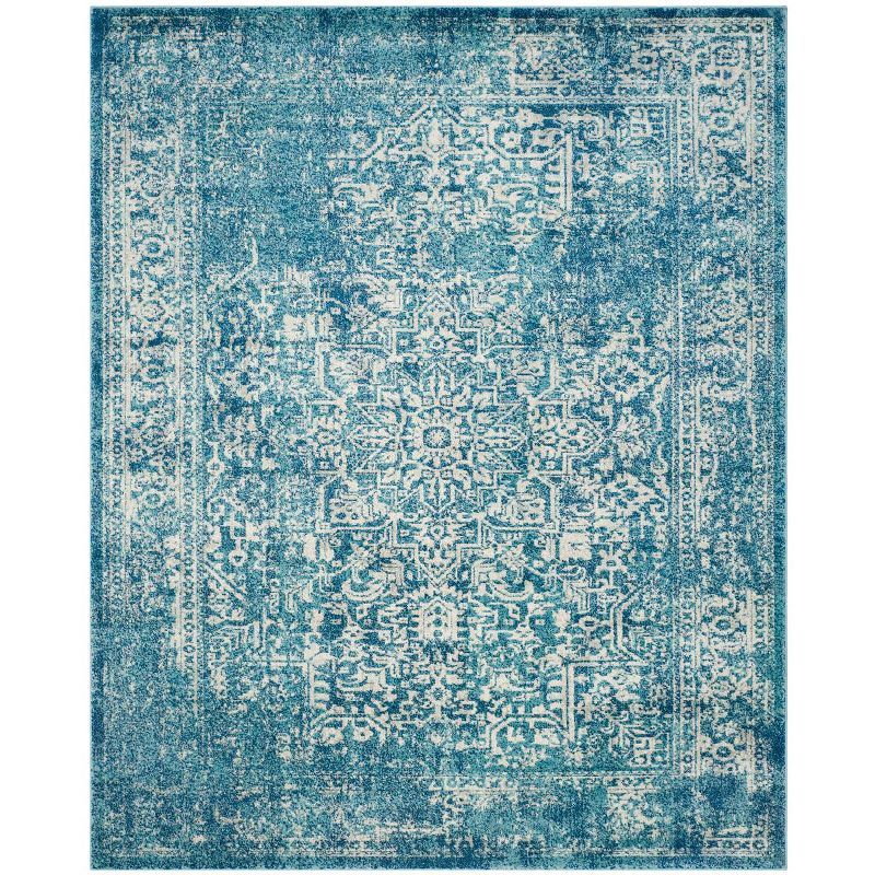 Rectangular 10' x 14' Blue and Ivory Synthetic Area Rug